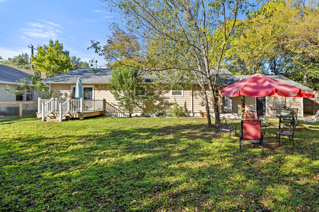 1221 South Austin Avenue Georgetown, TX 78626 - Photo 16 of 19 a view of a house with a yard porch and sitting area