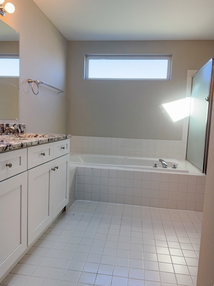 1183 Moonstone Run Lake In The Hills, IL 60156 - Photo 26 of 41 a view of a kitchen with white cabinets