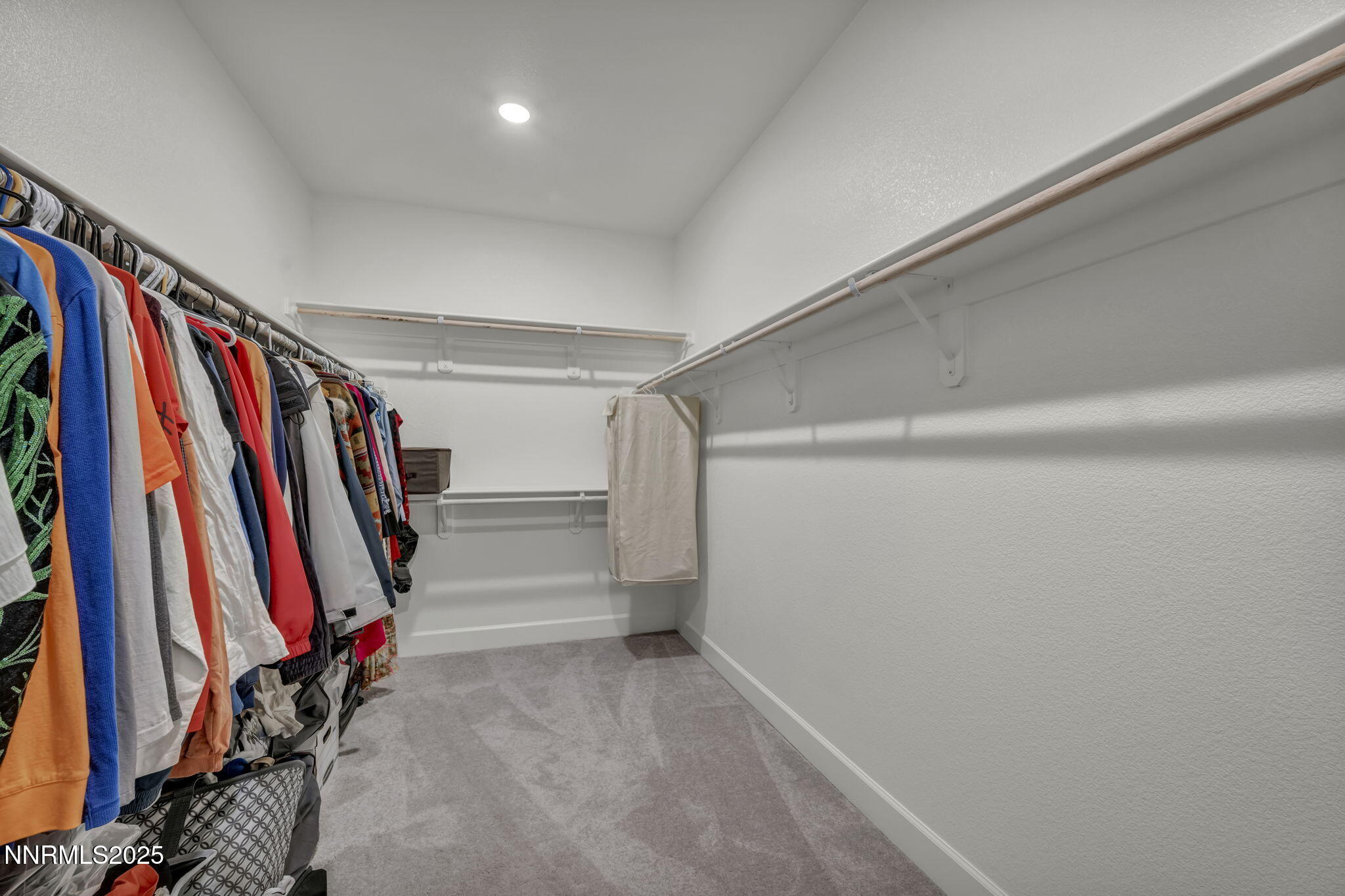 6870 Pilot Peak Road Sparks, NV 89436 - Photo 13 of 55 a view of walk in closet with clothes