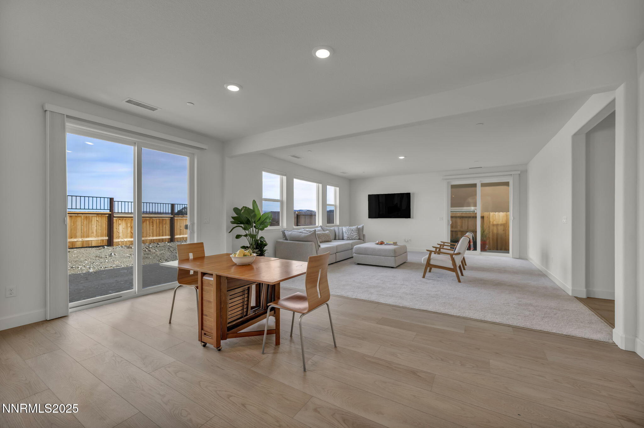 6870 Pilot Peak Road Sparks, NV 89436 - Photo 22 of 55 a view of a dining room with furniture window and outside view