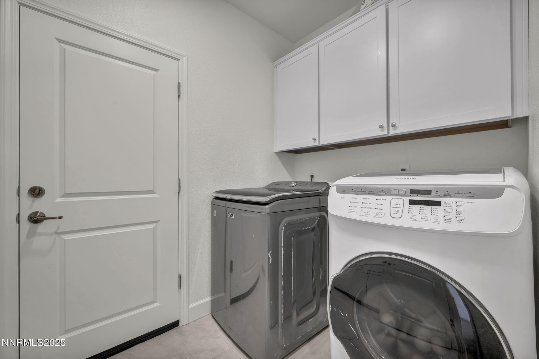 6870 Pilot Peak Road Sparks, NV 89436 - Photo 29 of 55 a utility room with dryer and washer