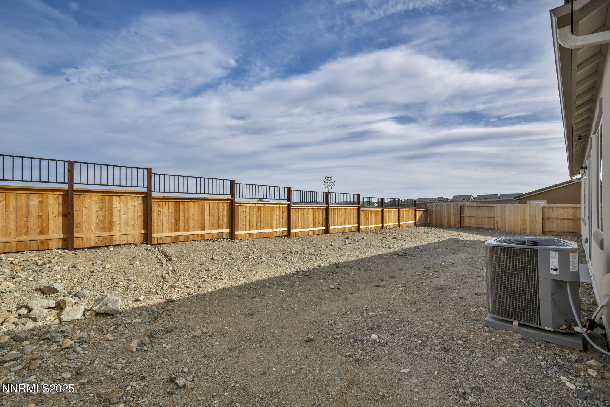 6870 Pilot Peak Road Sparks, NV 89436 - Photo 45 of 55 a view of an empty room with window