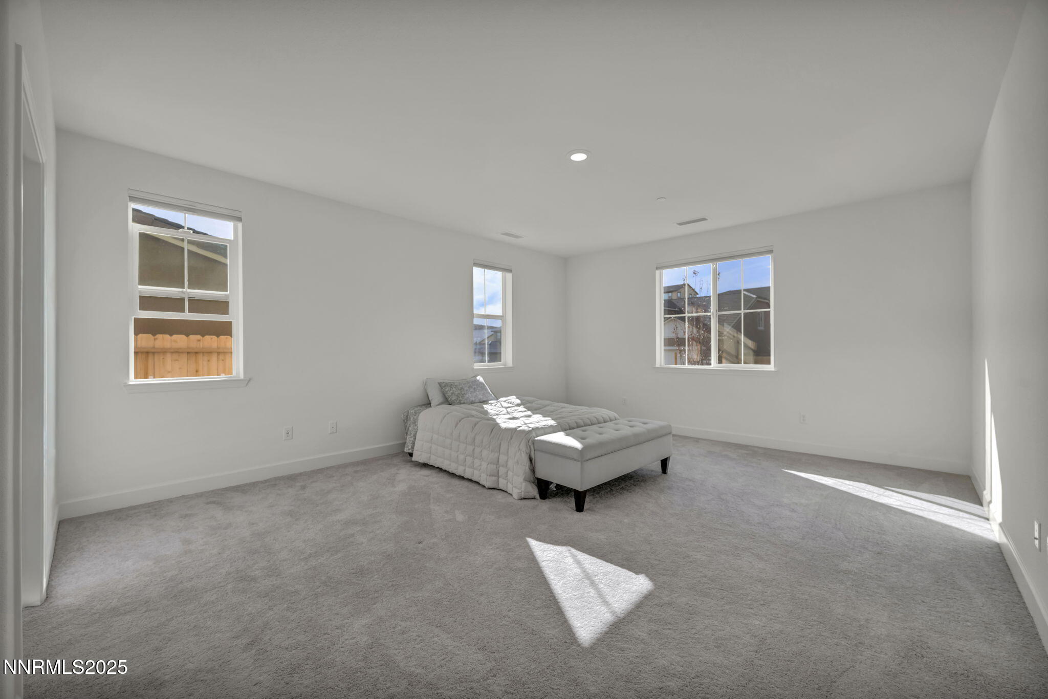 6870 Pilot Peak Road Sparks, NV 89436 - Photo 9 of 55 a living room with furniture and a window