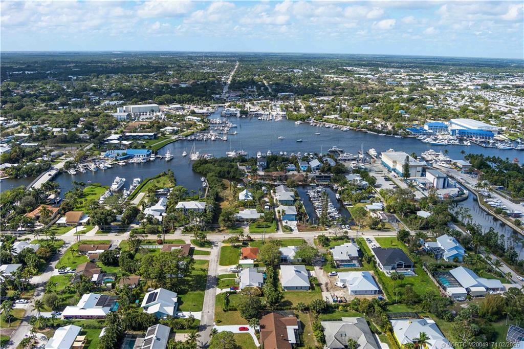 4732 Starling Way Stuart, FL 34997 - Photo 40 of 43 an aerial view of residential houses with city view
