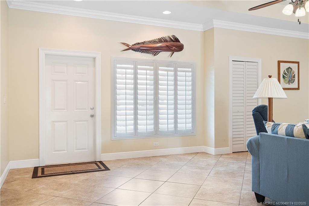 4732 Starling Way Stuart, FL 34997 - Photo 10 of 43 a view of an empty room with a window
