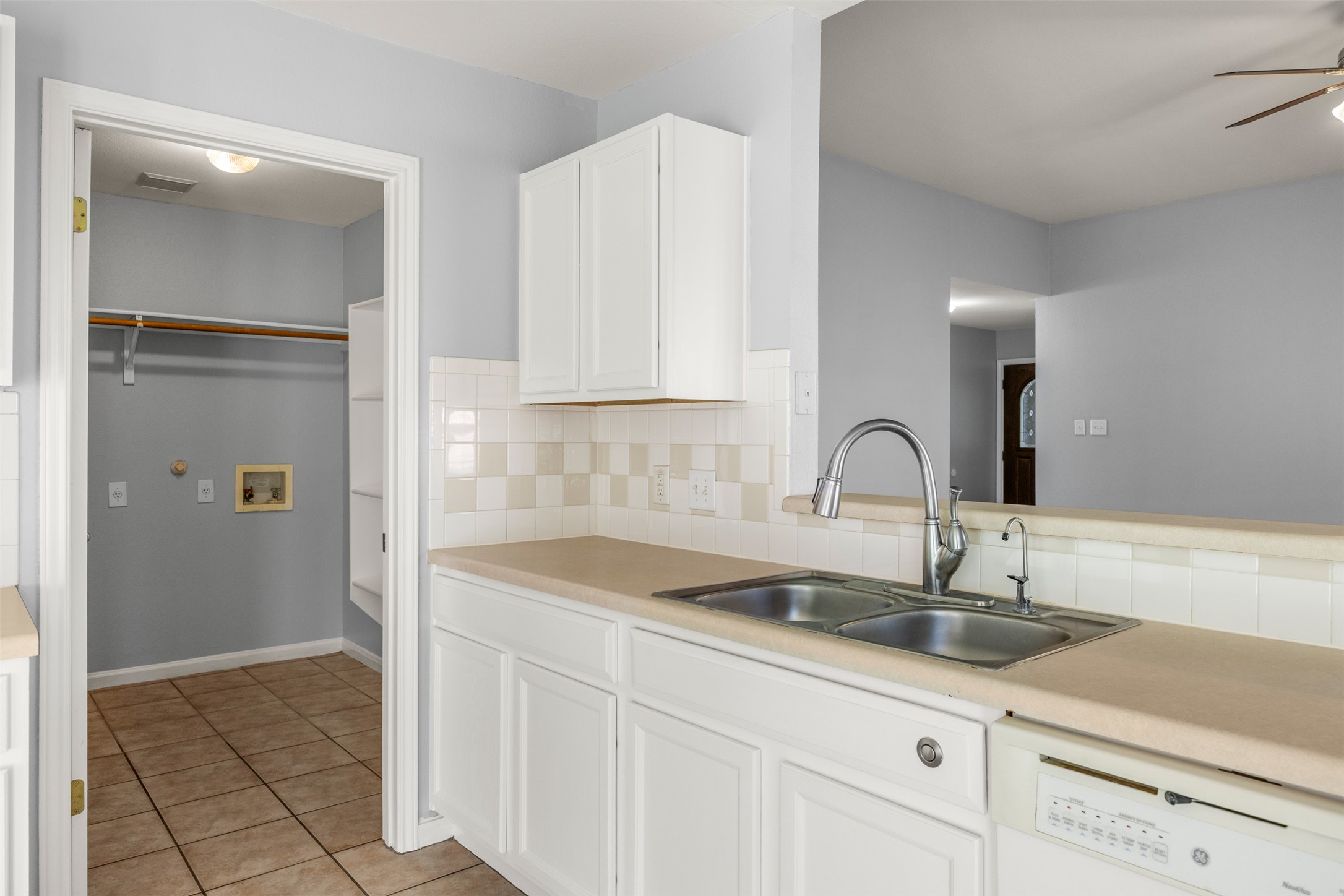 121 Primrose Boulevard Kyle, TX 78640 - Photo 15 of 19 a kitchen with sink and cabinets