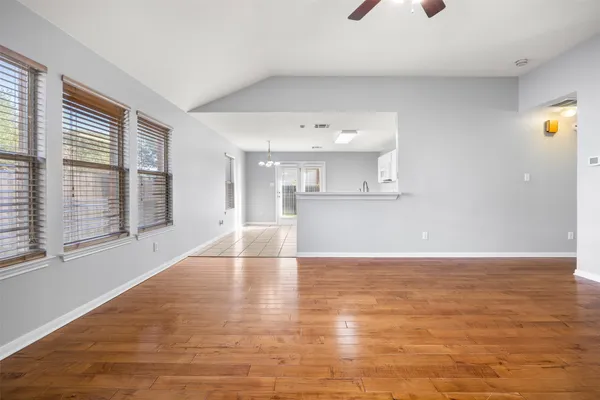 a view of an empty room with a window