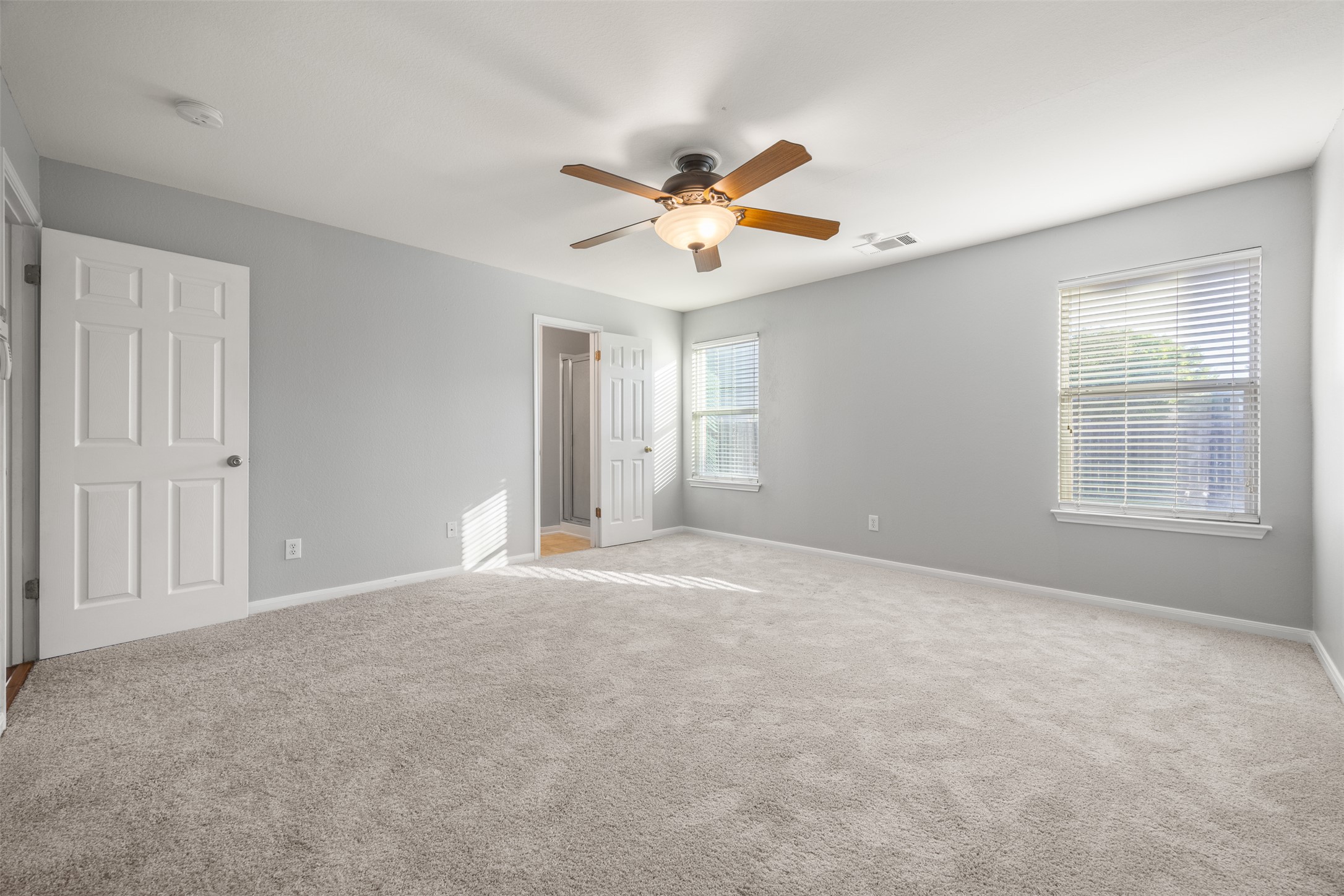 121 Primrose Boulevard Kyle, TX 78640 - Photo 10 of 19 a view of an empty room with a window