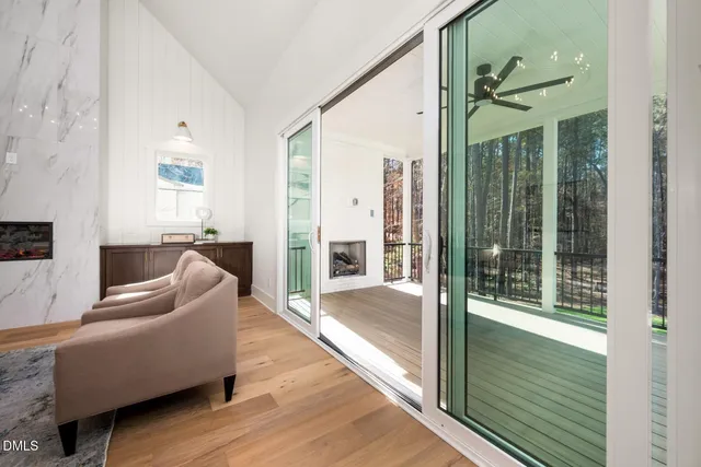 a bedroom with a bed and a hallway