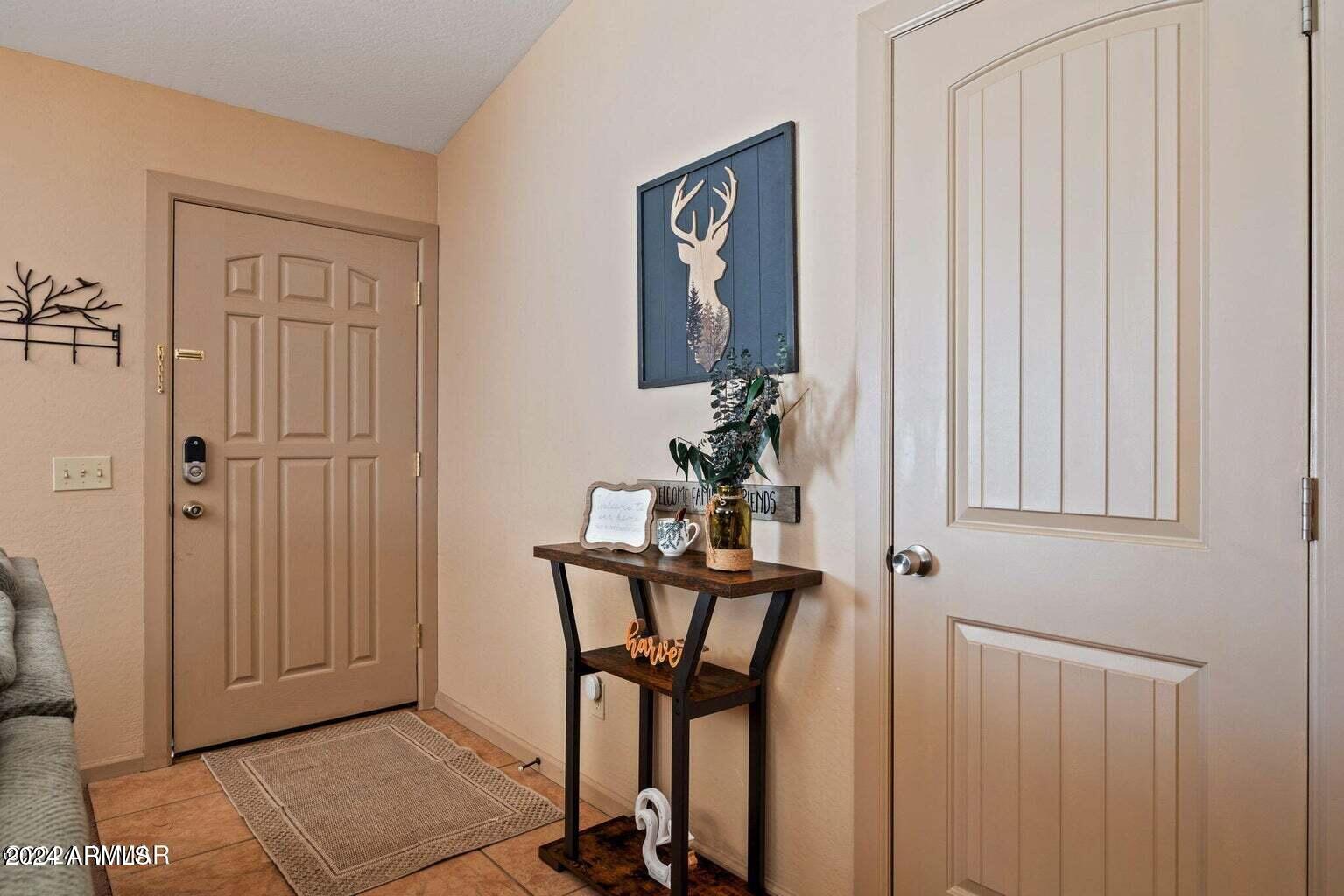 2086 Pinewood Drive Overgaard, AZ 85933 - Photo 14 of 33 a view of a hallway with furniture and a potted plant