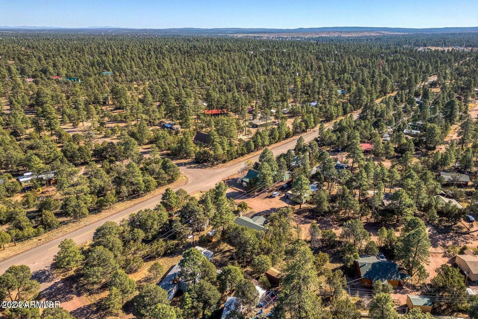 2086 Pinewood Drive Overgaard, AZ 85933 - Photo 30 of 33 a view of city and mountain