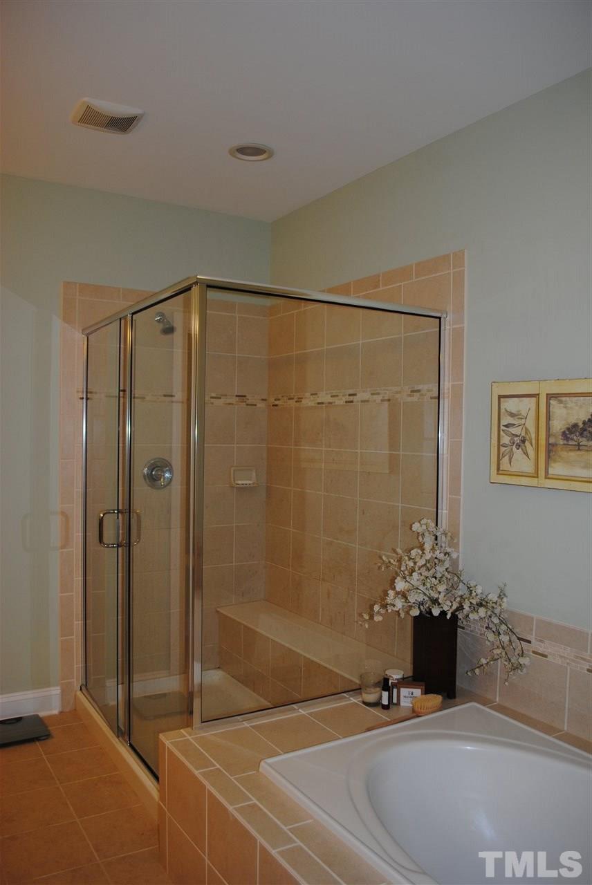 2352 Noble Road Raleigh, NC 27608 - Photo 12 of 24 a bathroom with a shower and a sink