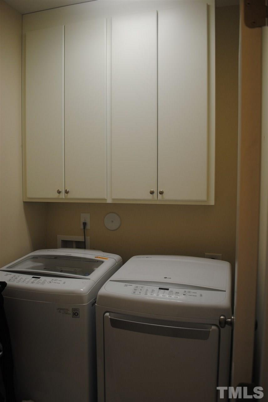 2352 Noble Road Raleigh, NC 27608 - Photo 22 of 24 a utility room with dryer and washer