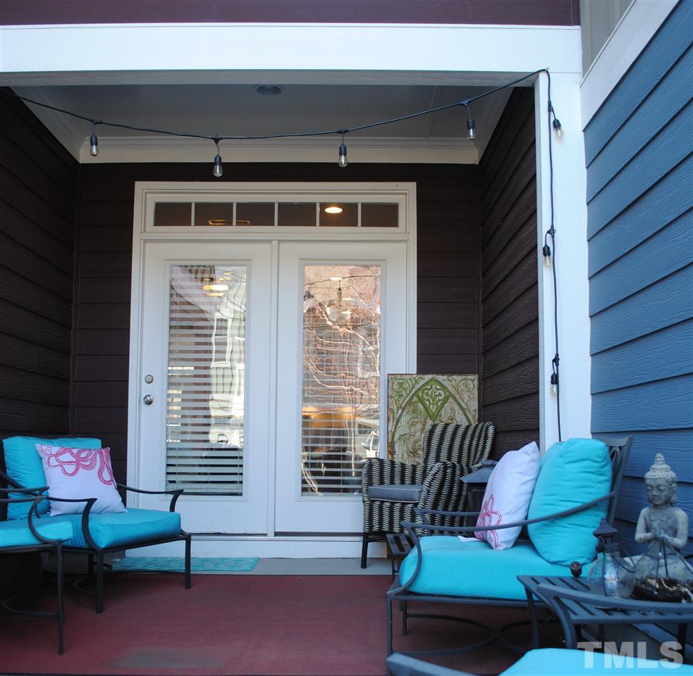 2352 Noble Road Raleigh, NC 27608 - Photo 23 of 24 a outdoor living space with patio furniture and potted plants