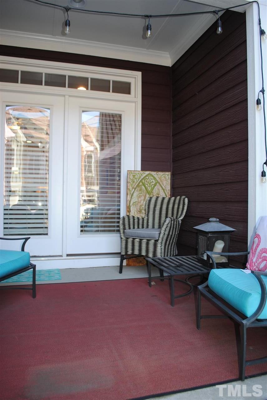 2352 Noble Road Raleigh, NC 27608 - Photo 24 of 24 a bedroom with furniture and a window