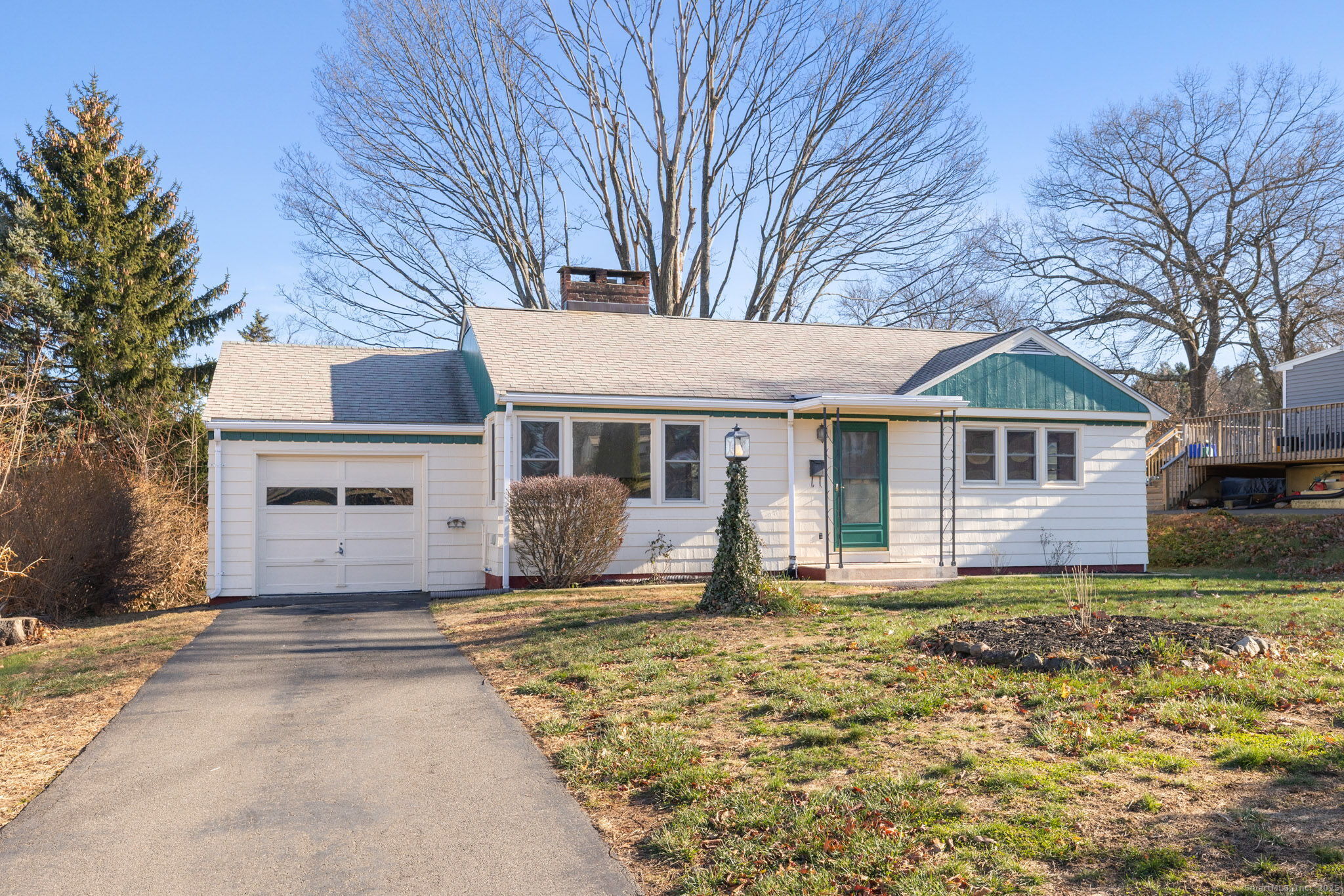 95 Tuttle Street Bristol, CT 06010 - Photo 2 of 28 a front view of a house with a yard