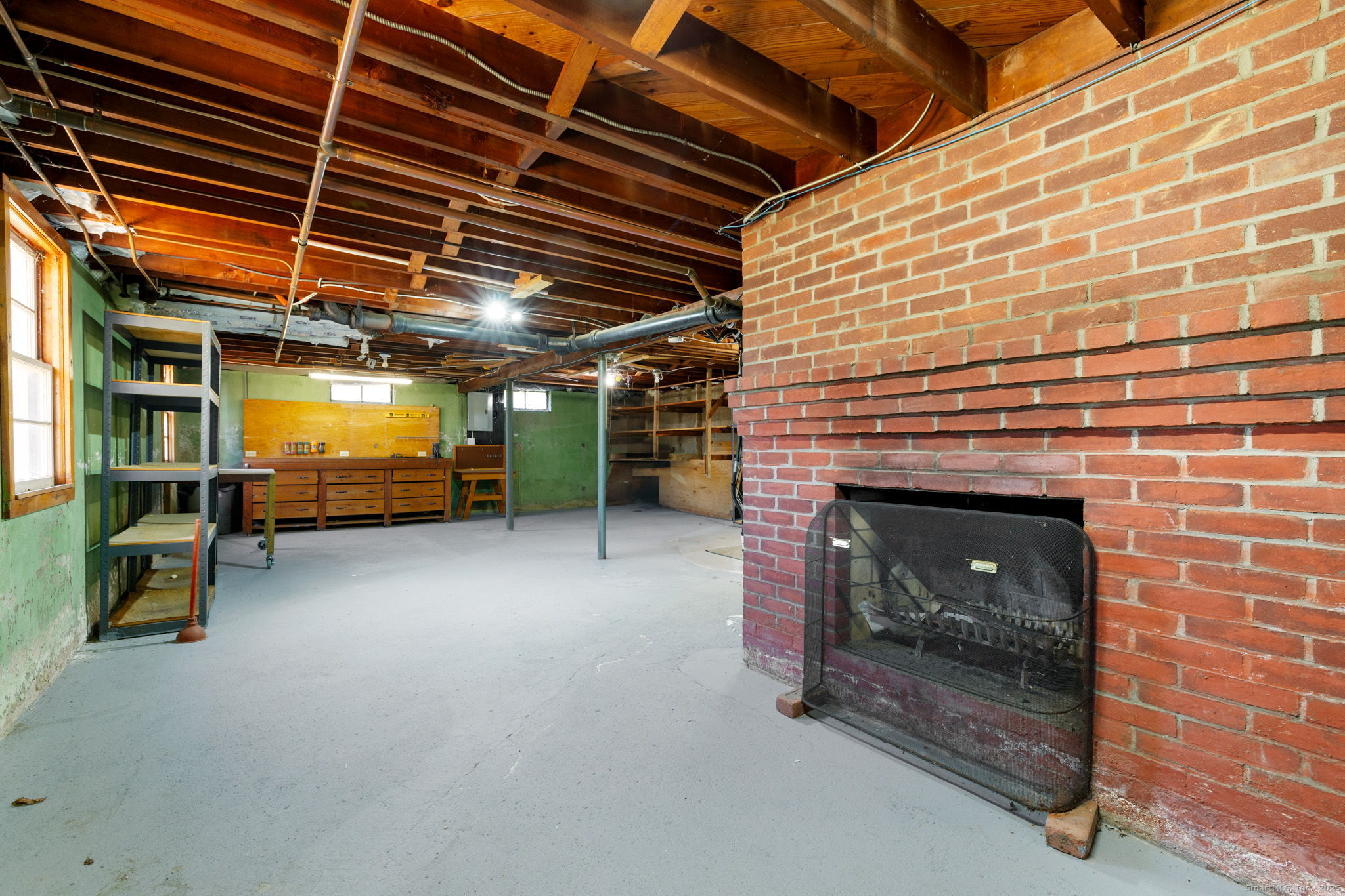 95 Tuttle Street Bristol, CT 06010 - Photo 22 of 28 a view of an empty room with a fireplace