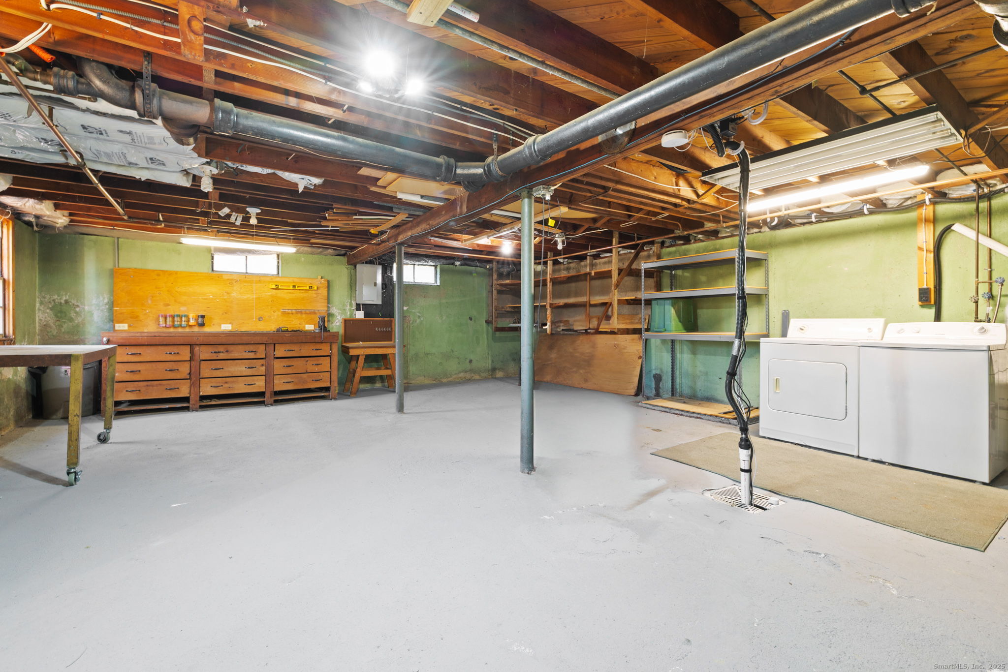 95 Tuttle Street Bristol, CT 06010 - Photo 23 of 28 a view of an empty room with a garage