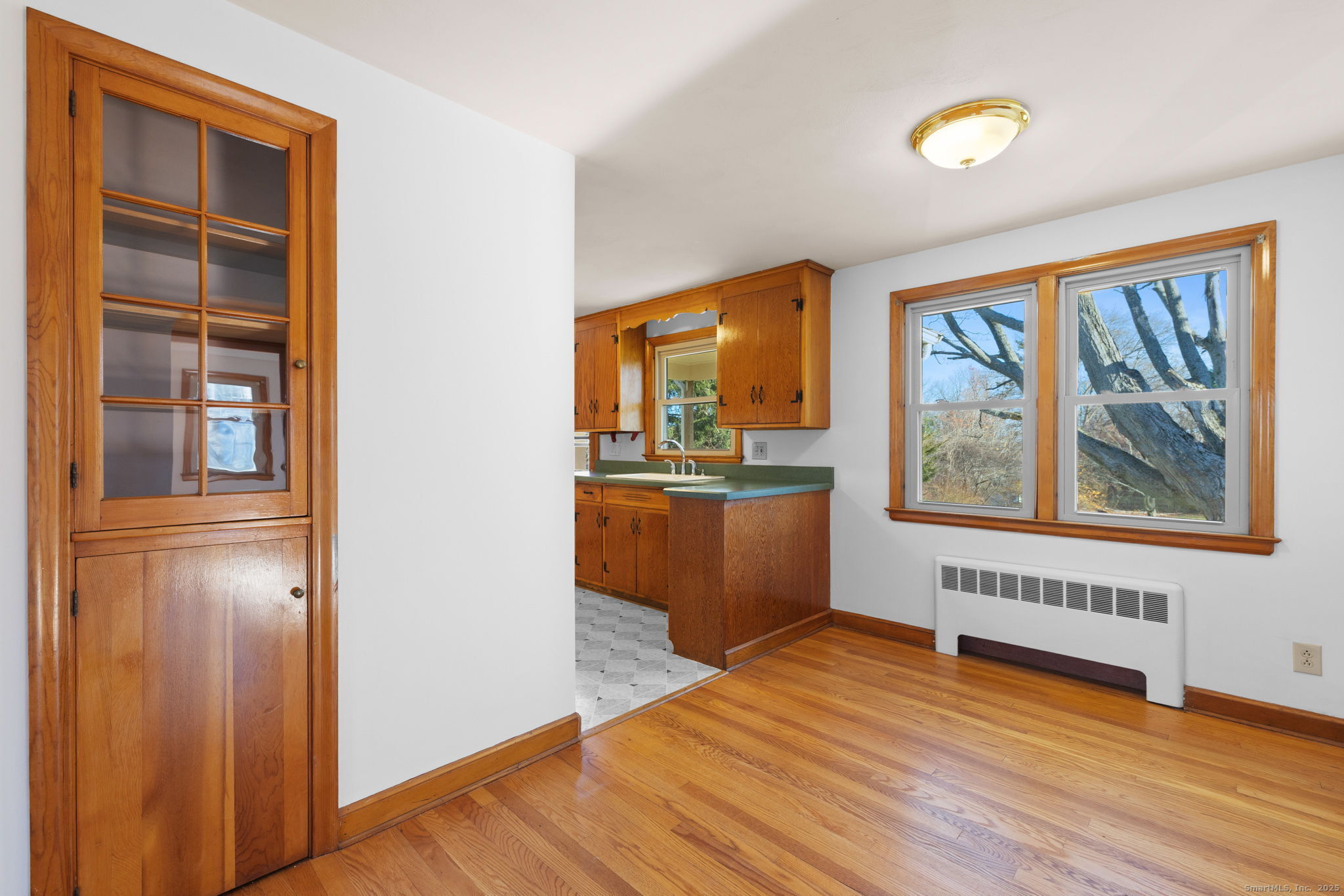 95 Tuttle Street Bristol, CT 06010 - Photo 9 of 28 a view of a kitchen with furniture and windows