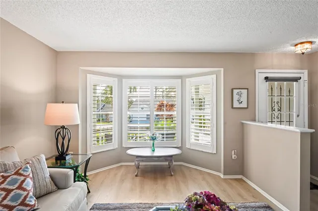 a kitchen with stainless steel appliances a stove microwave and a refrigerator