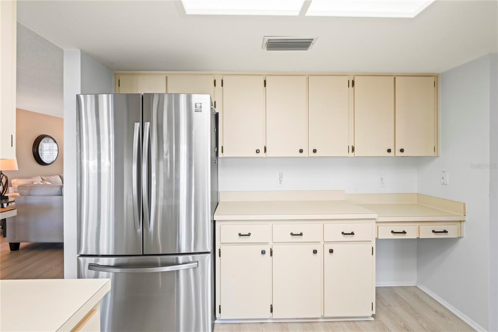 7107 Pond View Court Spring Hill, FL 34606 - Photo 16 of 100 a kitchen with appliances and cabinets