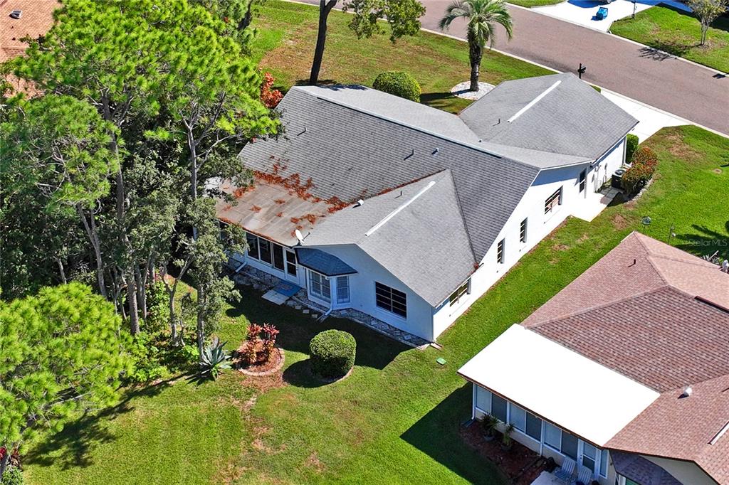 7107 Pond View Court Spring Hill, FL 34606 - Photo 54 of 100 an aerial view of a house with a yard