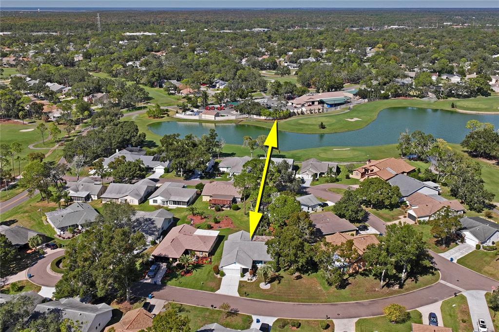 7107 Pond View Court Spring Hill, FL 34606 - Photo 70 of 100 an aerial view of residential houses with outdoor space