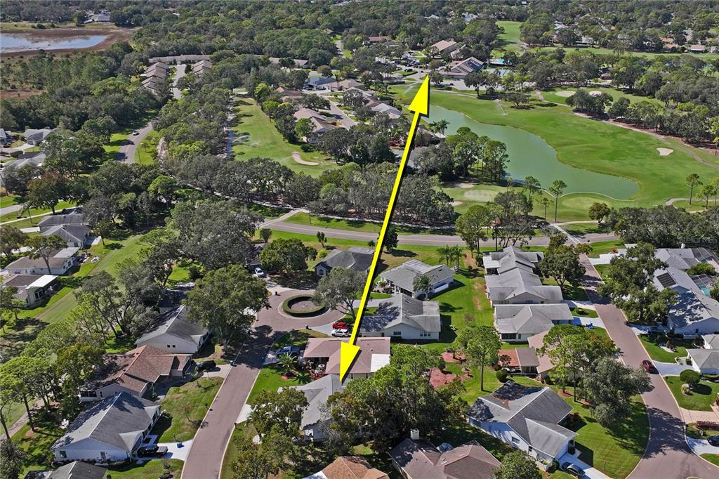 7107 Pond View Court Spring Hill, FL 34606 - Photo 71 of 100 an aerial view of residential houses with outdoor space and street view