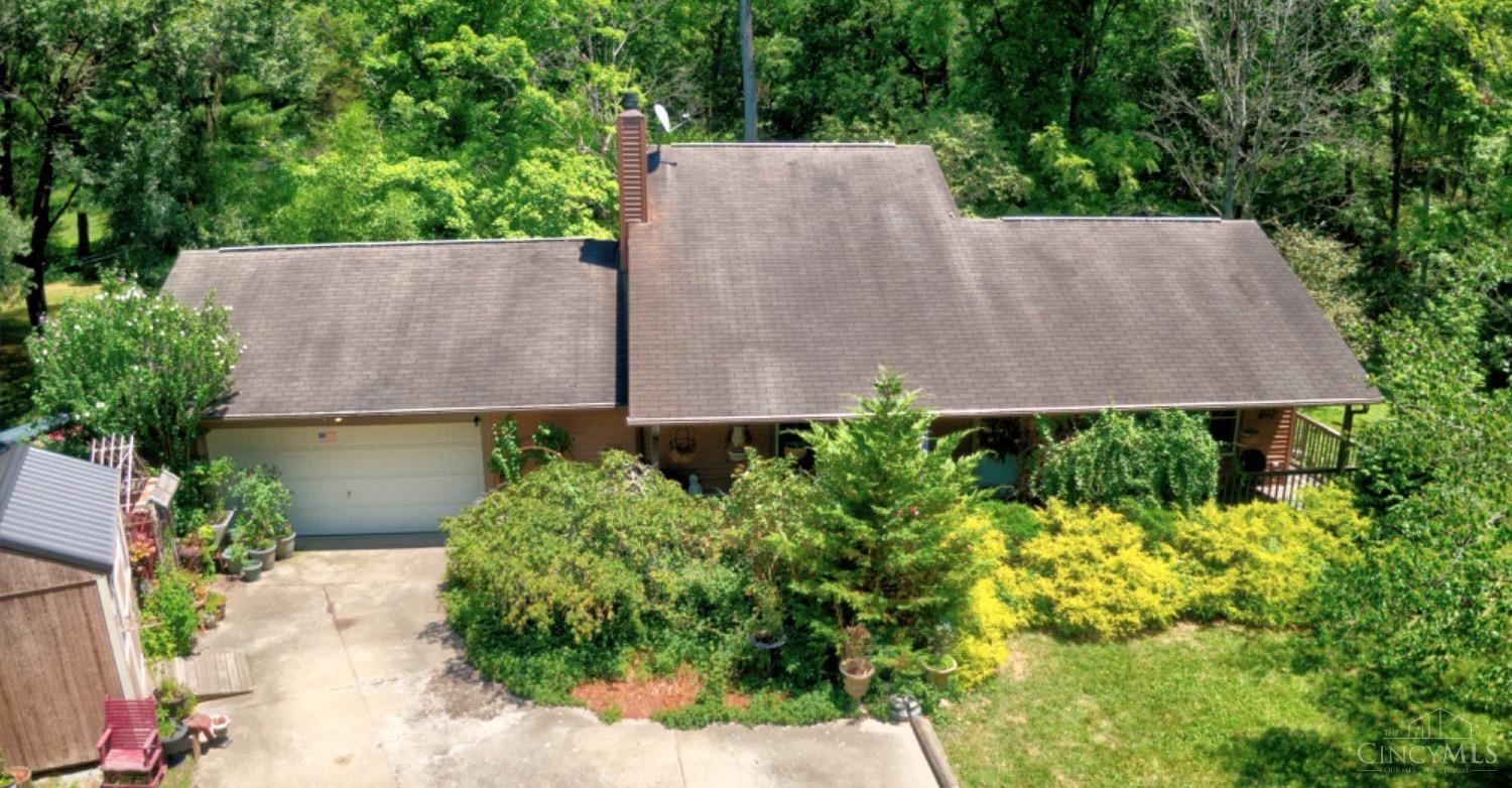 Enjoy Your Own Private Oasis Tucked Away on Nearly 2 Acres of Tranquility.