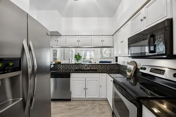 $310,000 | 217 Cimarron Trail, Unit 5, Irving, TX 75063