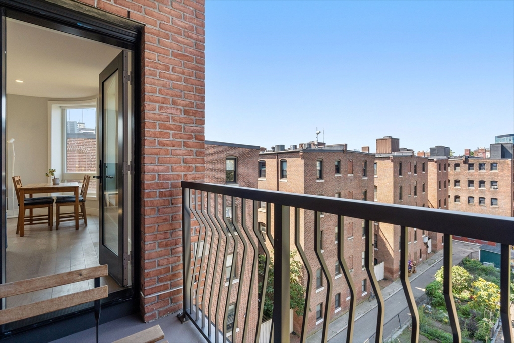 44-50 Symphony Road, Unit 403 Boston, MA 02115 - Photo 25 of 28 a view of city from a balcony