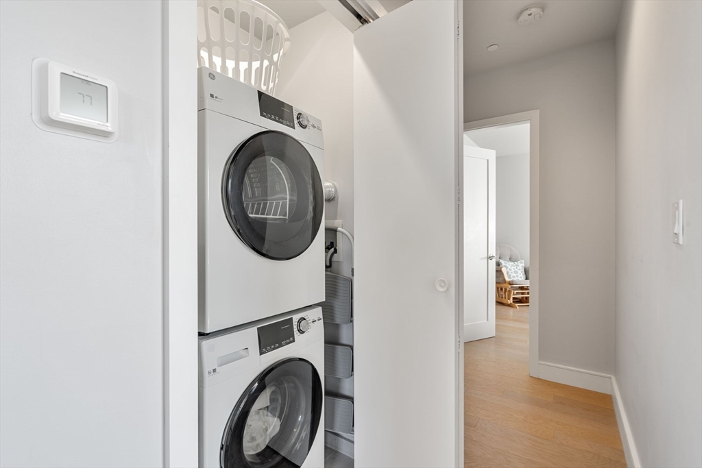 44-50 Symphony Road, Unit 403 Boston, MA 02115 - Photo 26 of 28 a utility room with dryer and washer
