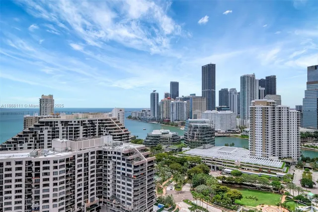a view of a city with tall buildings