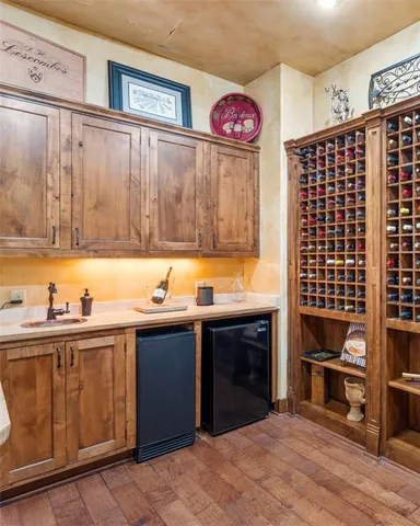 a view of a hallway with a large window and couch