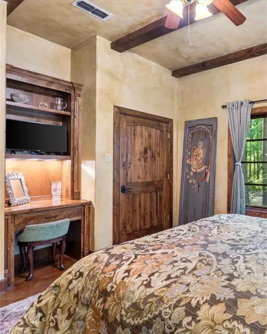 a bedroom with a bed and furniture