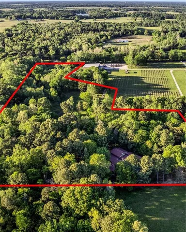 an aerial view of swimming pool and outdoor space