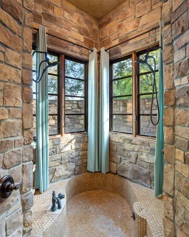 a bathroom with a sink vanity and a mirror