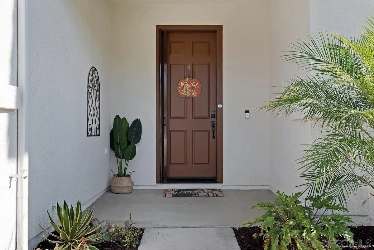717 Via Cafetal San Marcos, CA 92069 - Photo 14 of 41 a view of entryway with paintings on the wall