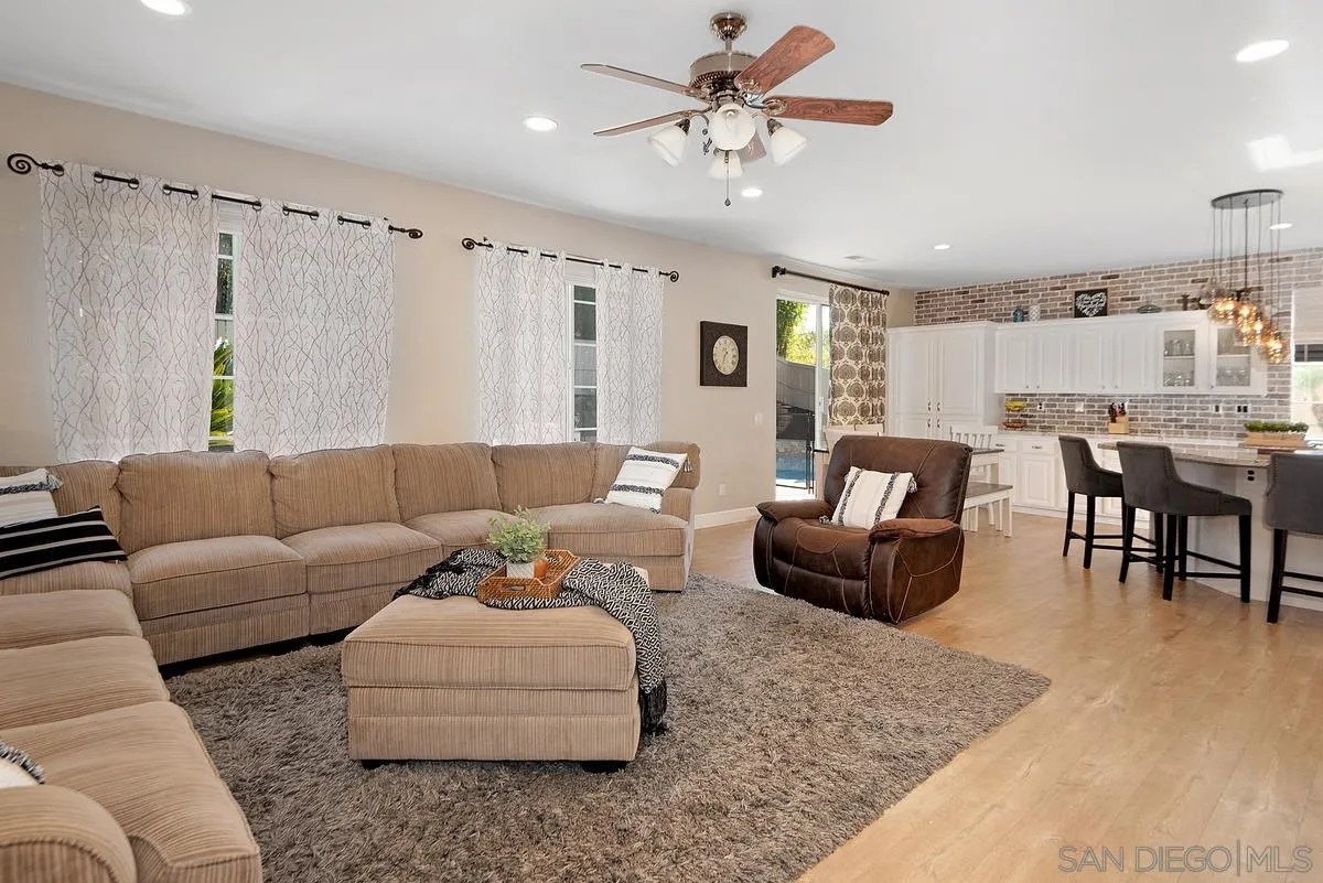 717 Via Cafetal San Marcos, CA 92069 - Photo 23 of 41 a living room with furniture and view of kitchen