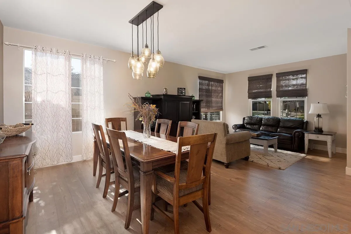 717 Via Cafetal San Marcos, CA 92069 - Photo 27 of 41 a view of a dining room with furniture window and wooden floor