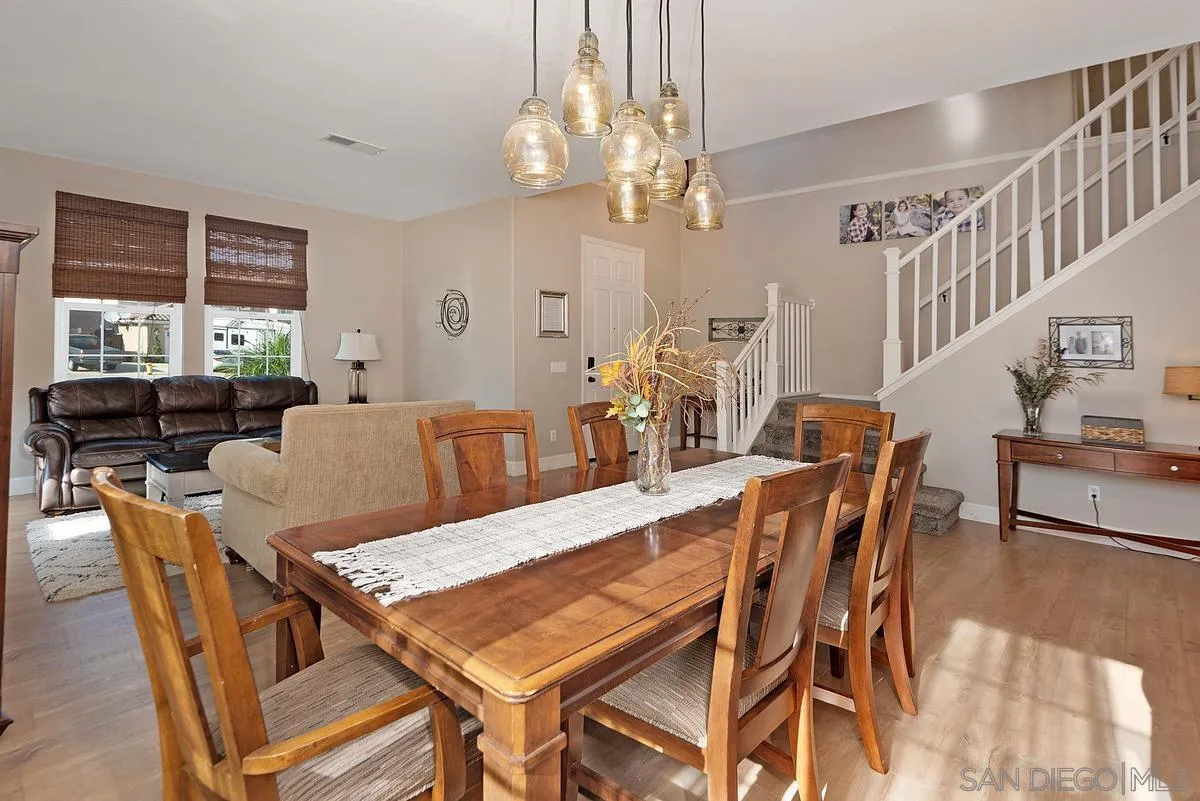 717 Via Cafetal San Marcos, CA 92069 - Photo 28 of 41 a view of a dining room with furniture and a chandelier