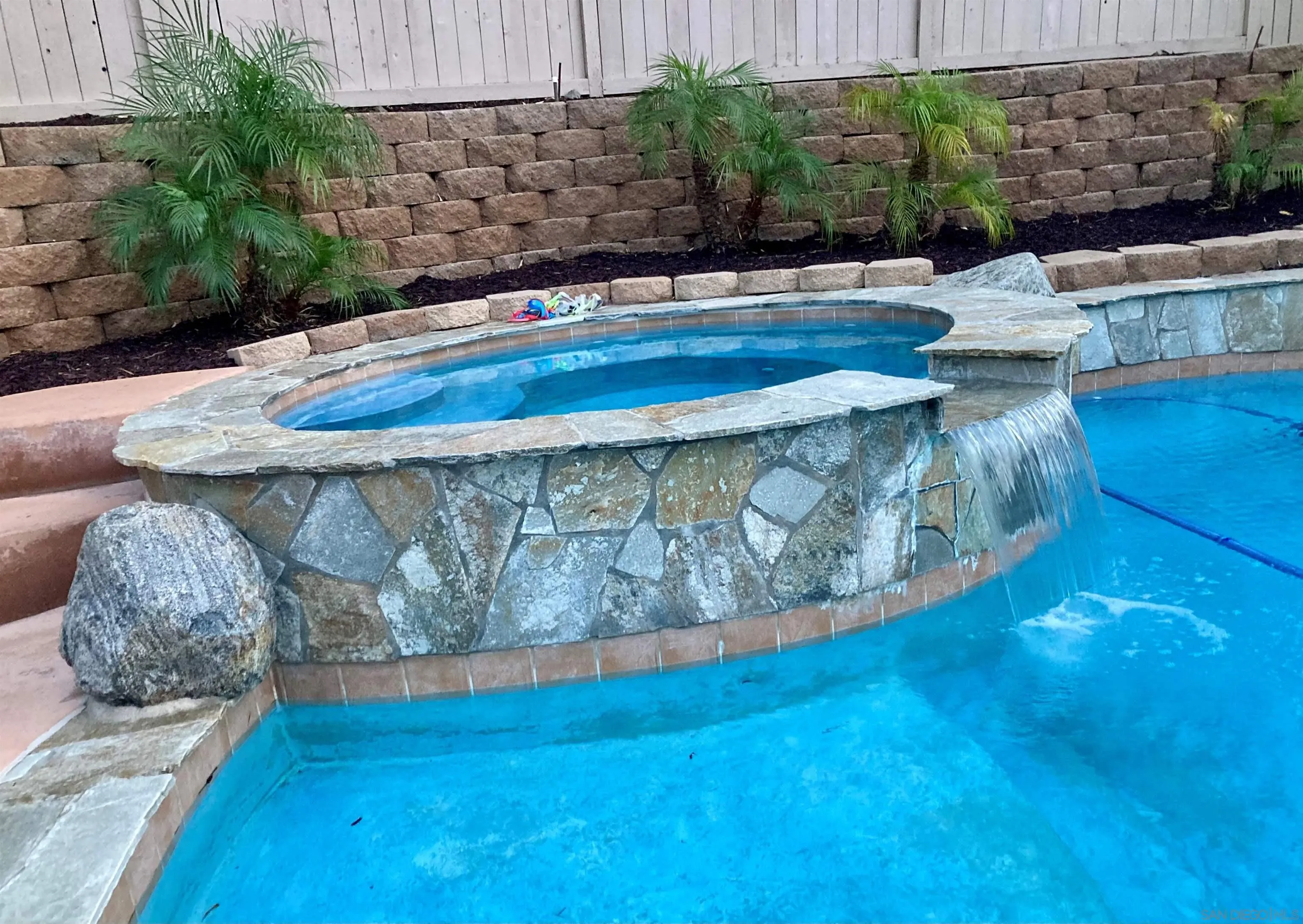 717 Via Cafetal San Marcos, CA 92069 - Photo 6 of 41 a view of swimming pool with a yard