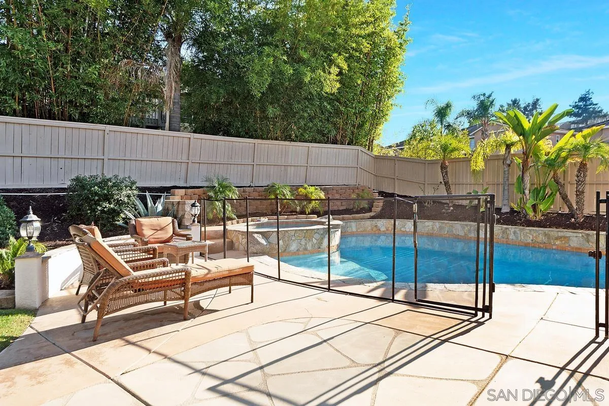 717 Via Cafetal San Marcos, CA 92069 - Photo 7 of 41 a view of a backyard with sitting area