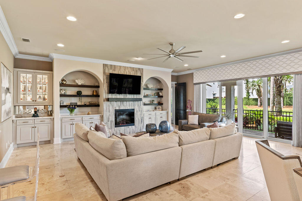 20 St Barts Bay Destin, FL 32541 - Photo 13 of 93 a living room with furniture fireplace and flat screen tv