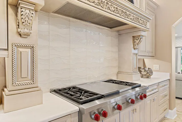 a bedroom with a bed and a flat tv screen on wall