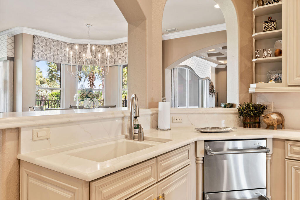 20 St Barts Bay Destin, FL 32541 - Photo 18 of 93 a bathroom with a sink and a large mirror
