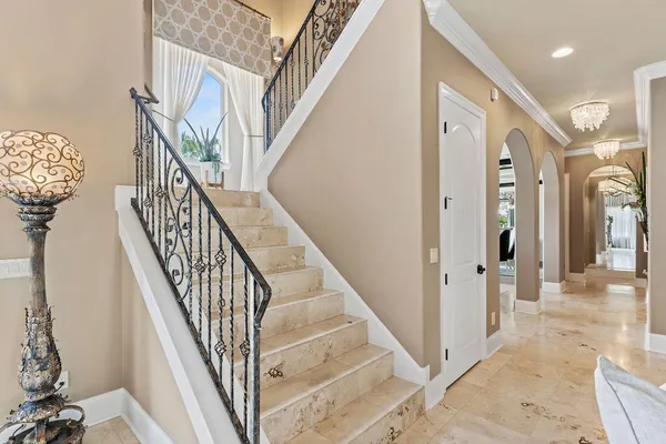 a spacious bathroom with a double vanity sink double mirror and bathtub