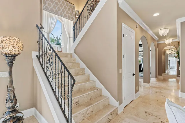 a spacious bathroom with a double vanity sink double mirror and bathtub