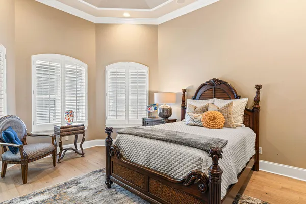 a view of a swimming pool with patio