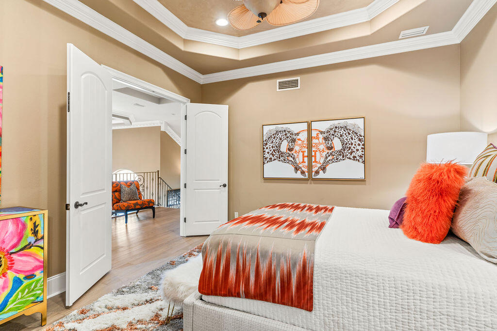 20 St Barts Bay Destin, FL 32541 - Photo 35 of 93 a bedroom with a bed and a couch